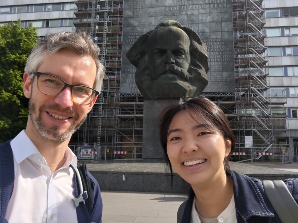 Shenyu Nie with the Karl Marx Monument in Chemnitz